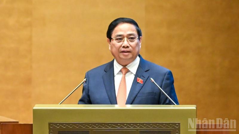 Thủ tướng Chính phủ Phạm Minh Chính trình bày Báo cáo kết quả thực hiện kế hoạch phát triển kinh tế-xã hội năm 2025 và 5 năm 2021-2025; dự kiến kế hoạch phát triển kinh tế-xã hội năm 2026. (Ảnh: DUY LINH)