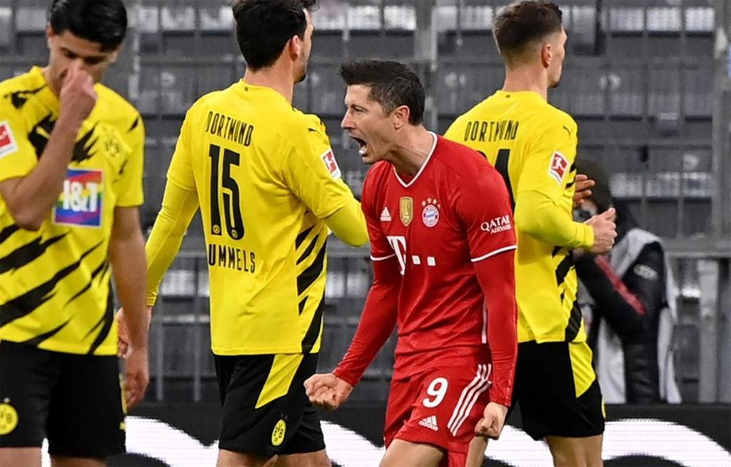 Lewandowski lập hat-trick, Bayern ngược dòng thắng đậm Dortmund